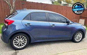 Blue Hatchback Kia Rio Window Tinting